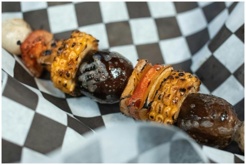 Close-up of a colorful grilled vegetable kebab on
