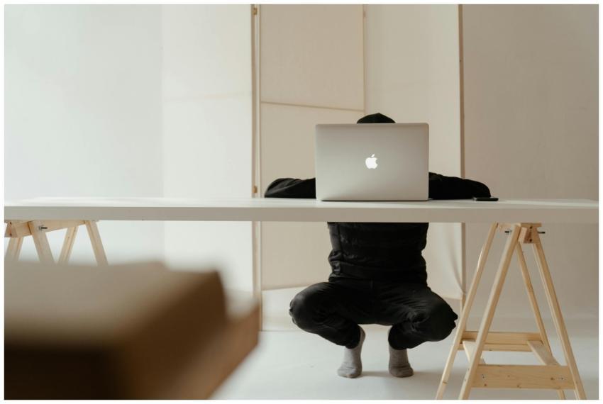 A person working in a minimalistic home office set