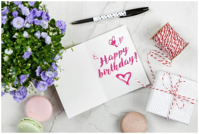 Charming birthday greeting card layout with macaro