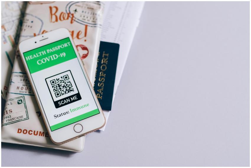 A smartphone with a COVID-19 health passport, pass
