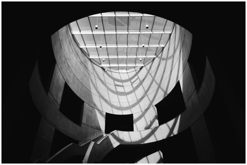 Dramatic black and white photo of a modern archite