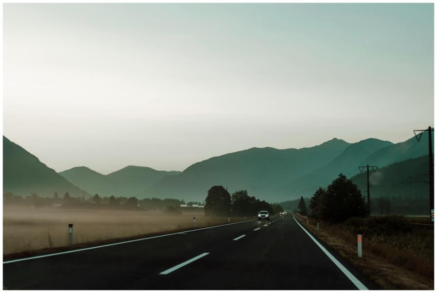 Beautiful foggy road in Kärnten, Austria, with a b