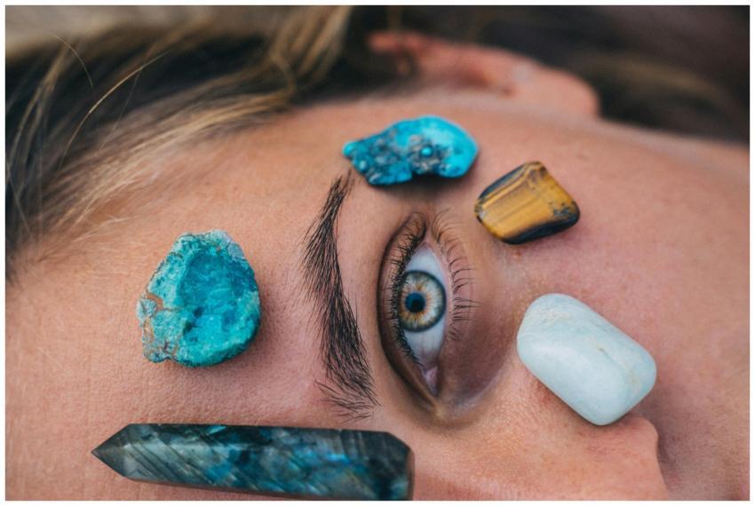 Close-up of a person's eye surrounded by vibrant h