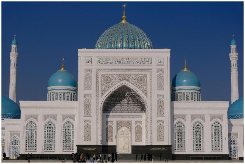Stunning view of a grand mosque with blue domes un