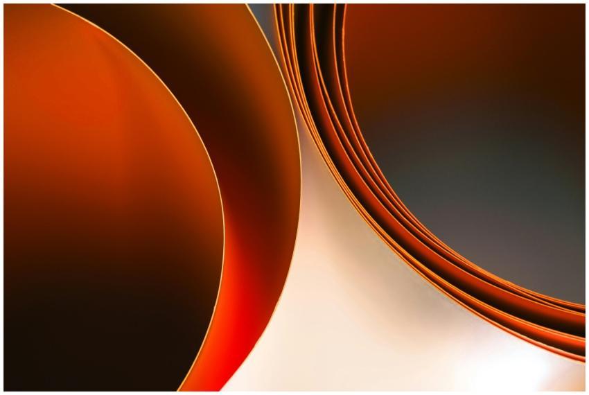 Vibrant abstract art featuring bold orange curved