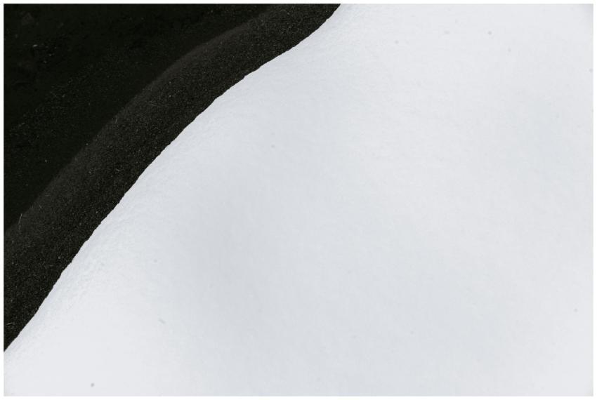 Top view of calm river flowing near bank covered w