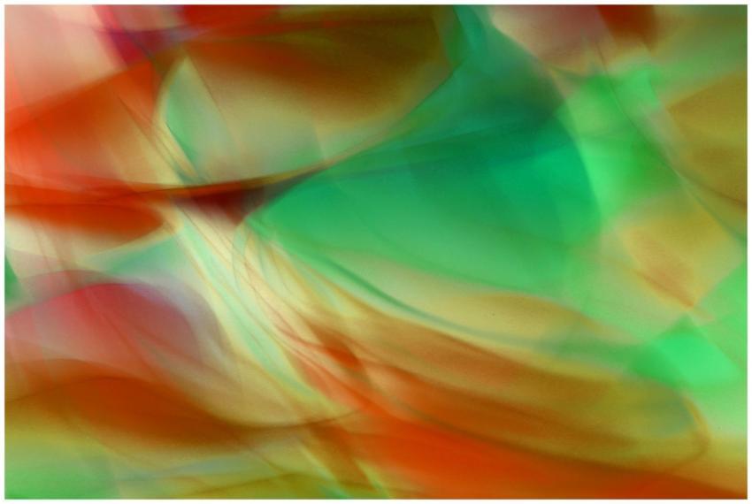 Dynamic abstract image featuring vibrant green, re