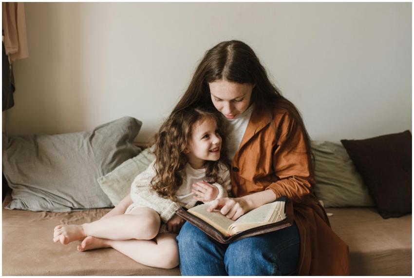 Mother and daughter enjoying a cozy reading moment