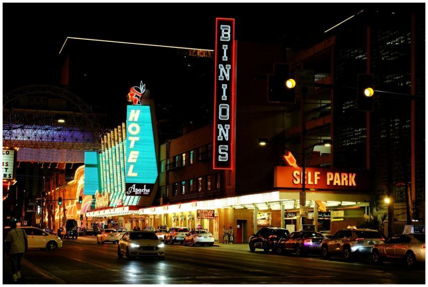 Neon lights illuminate Fremont Street, showcasing