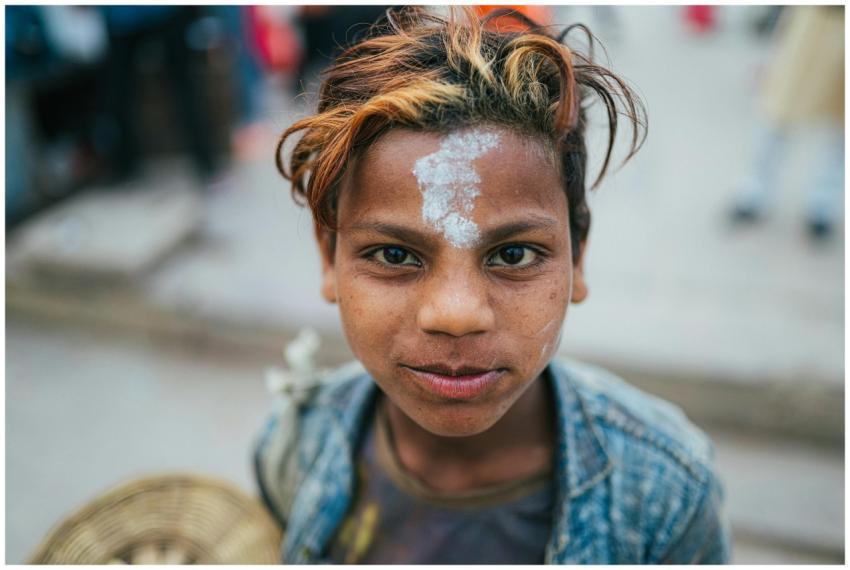 Close-up portrait of a boy with traditional markin