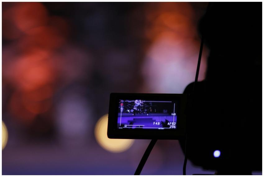 Close-up of a digital camera screen recording a sc