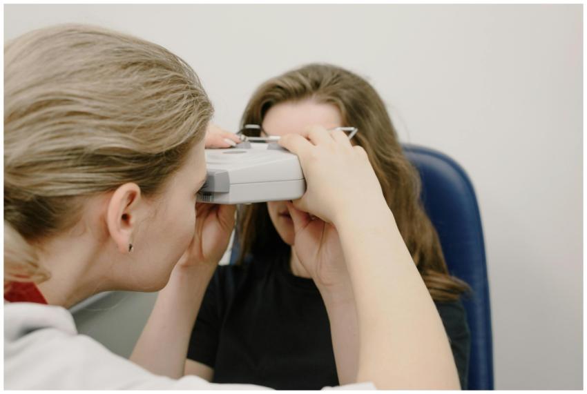 Anonymous female patient looking at optical micros