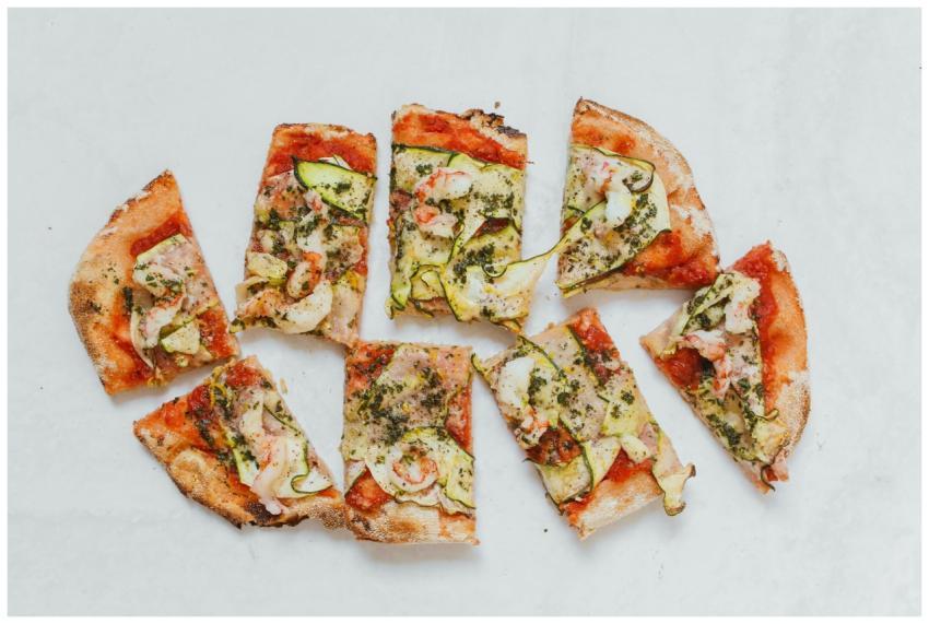 Delicious Italian pizza with zucchini and shrimp,