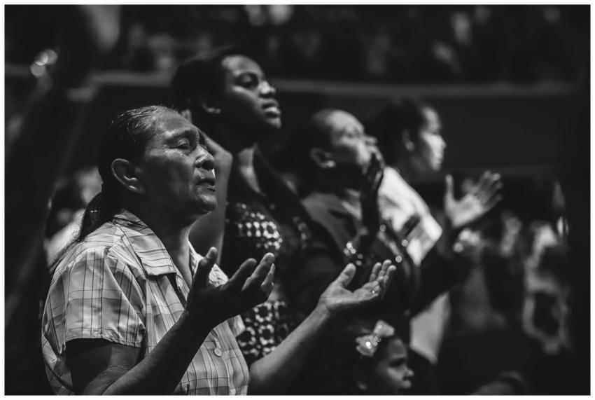 Black and white image of a diverse group of people