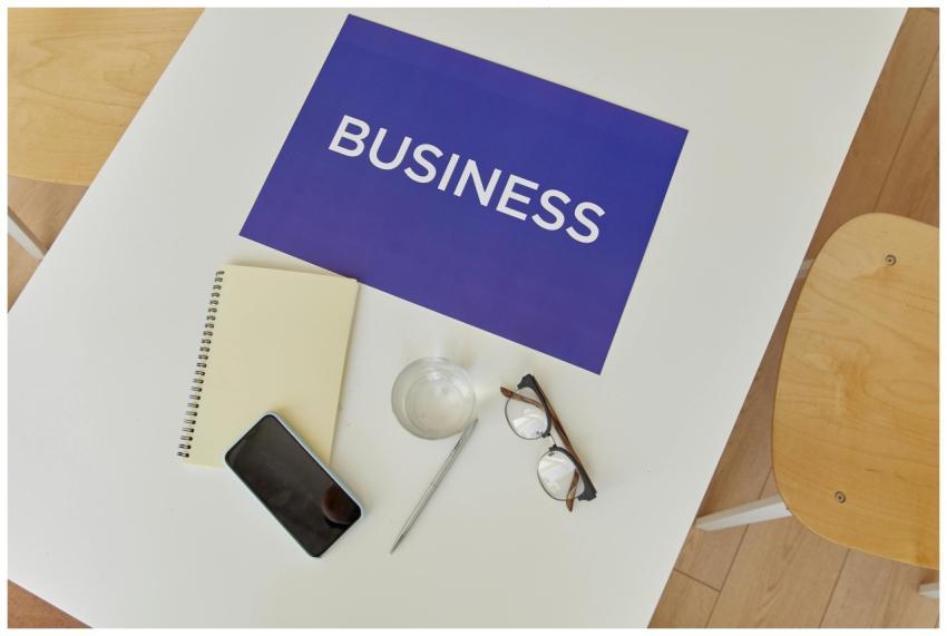 Top view of a minimalist business workspace with e