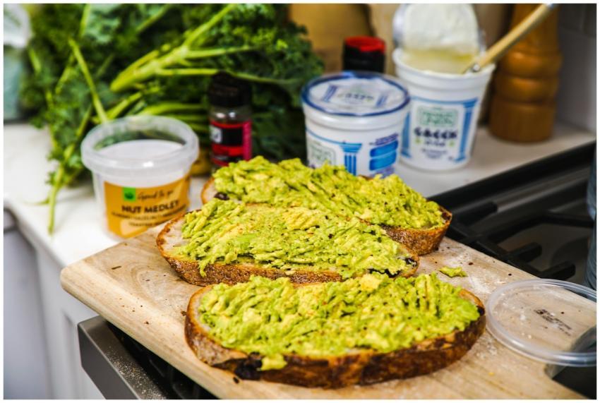 Delicious homemade avocado toast on a cutting boar