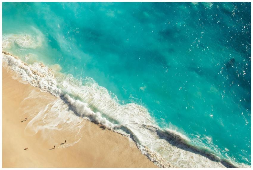 Stunning aerial view of a serene beach in Bali wit