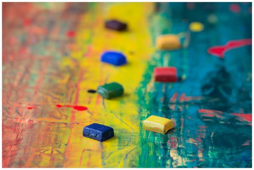 Close-up of vivid abstract art with colorful paint