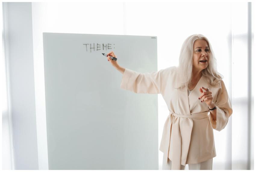 Adult female instructor teaching a theme on a whit