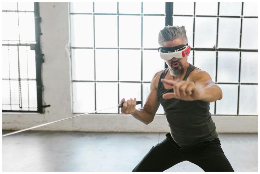 Adult man engaging in virtual training with a VR h