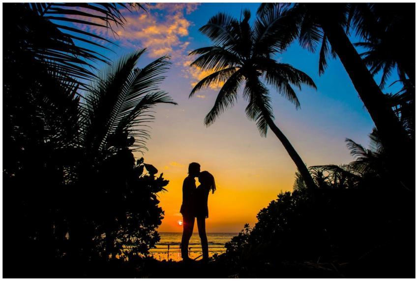 Silhouette of a couple sharing a romantic moment o