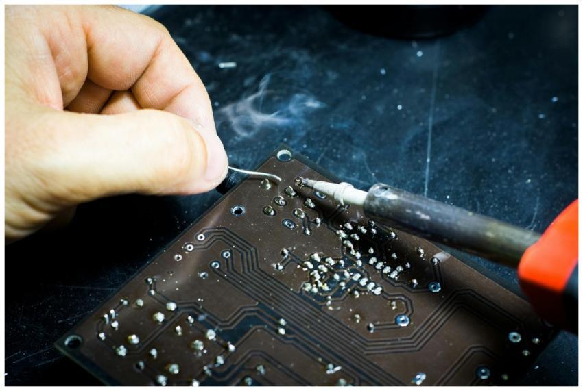 Hand soldering on a printed circuit board, showcas