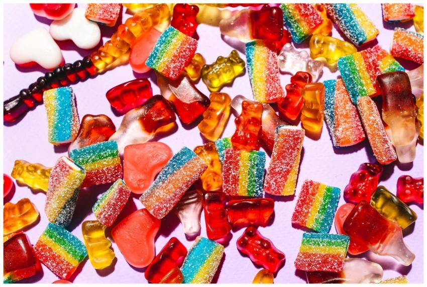 Colorful mix of gummy candies including bears and