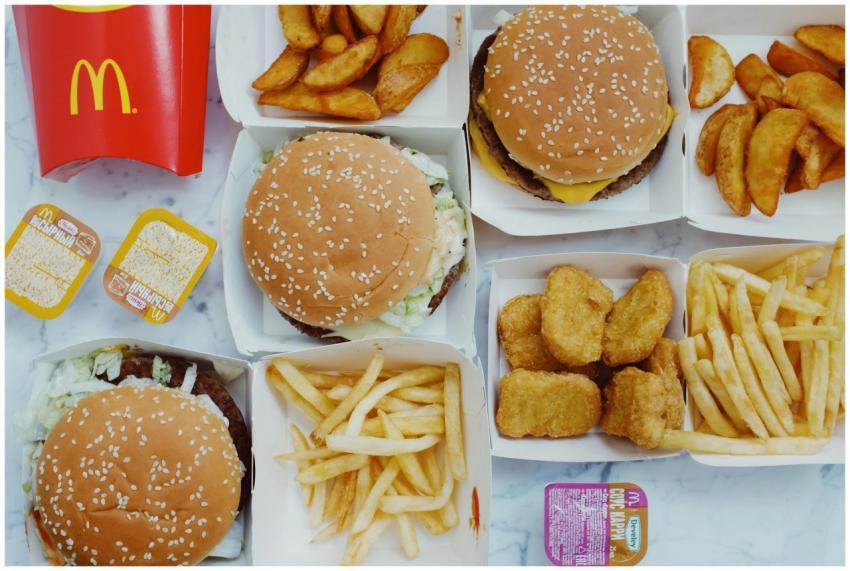 Top view flat lay of junk food including burgers w