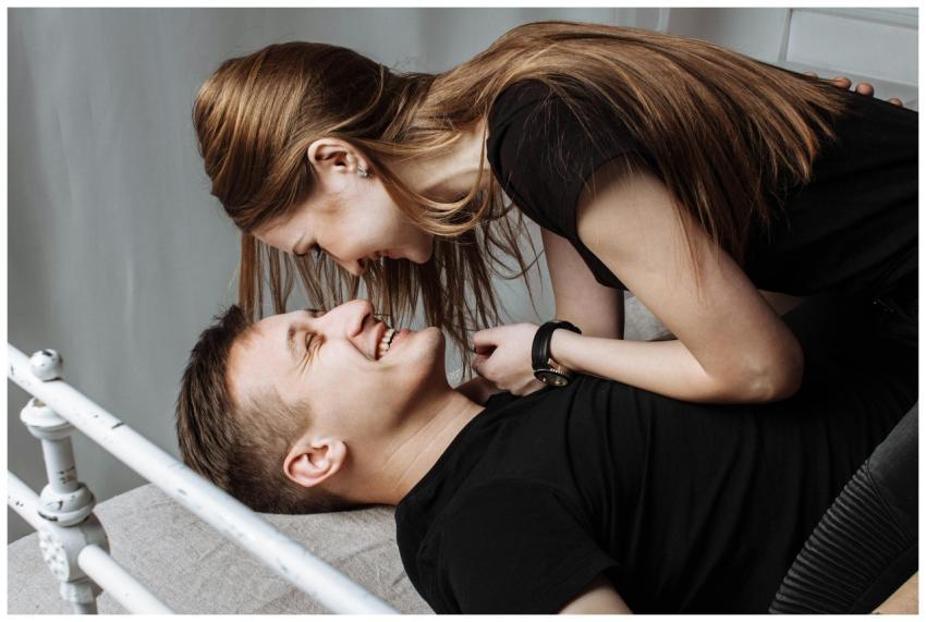 A joyful young couple enjoying intimate moments an