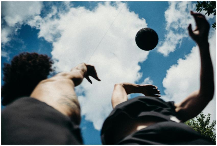 Low angle shot of basketball players shooting with