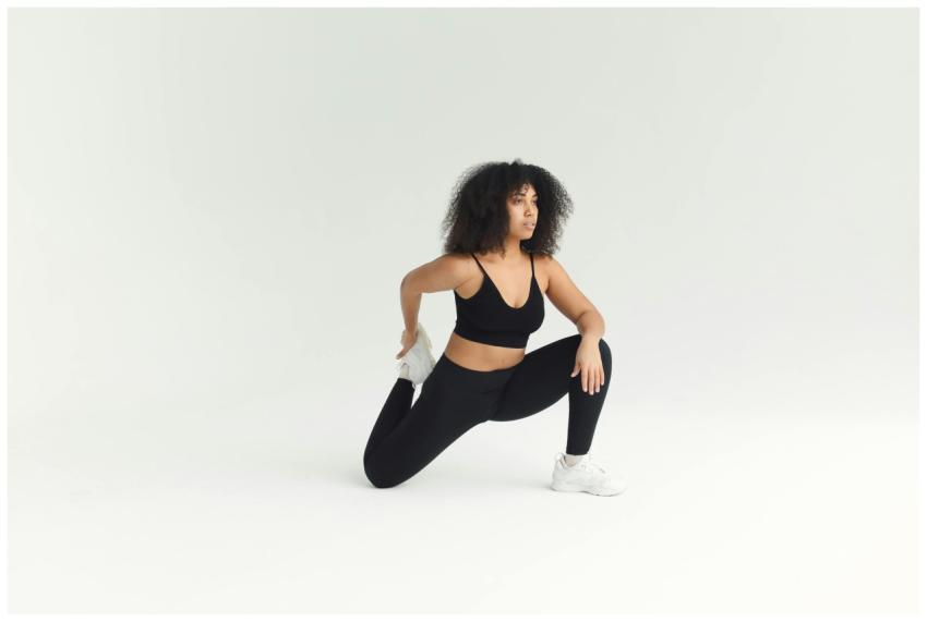 Adult woman engaged in fitness stretching routine