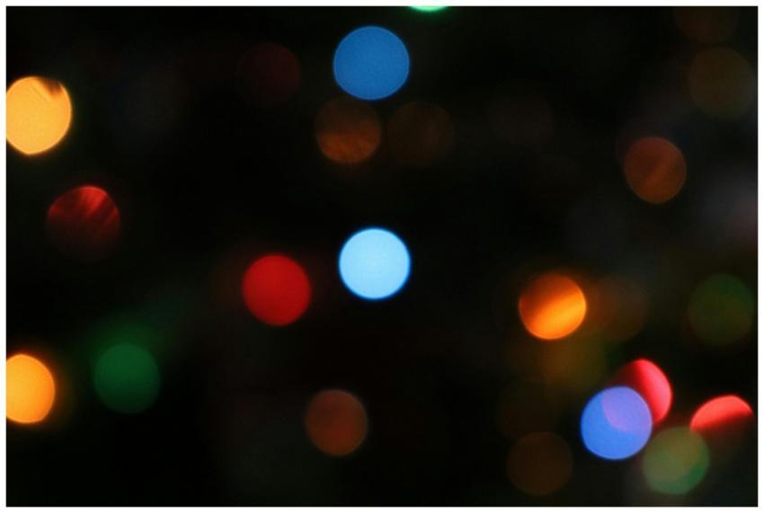 Colorful bokeh lights create a vivid and abstract