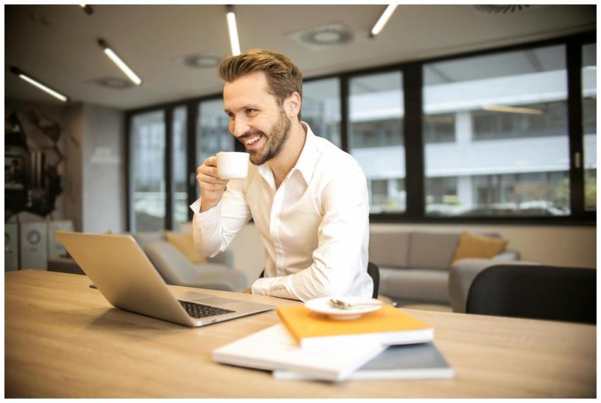 Man enjoying a coffee break while working in a mod