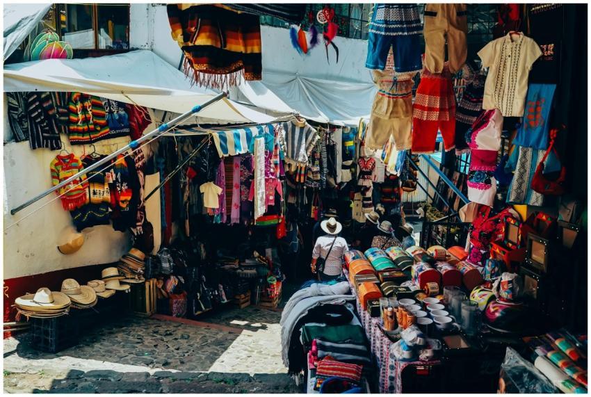A bustling outdoor market stall showcasing traditi