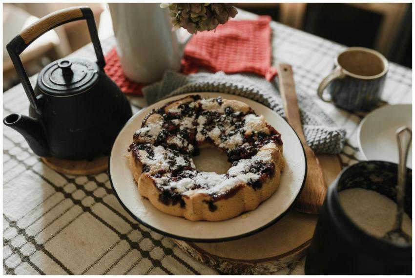 Cozy table setup featuring a homemade blueberry ca