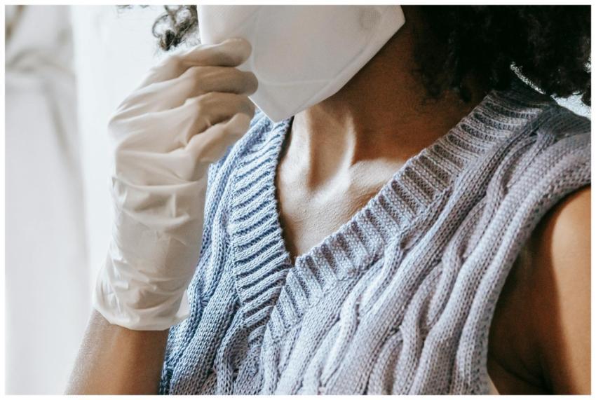 Close-up of a woman wearing a protective mask and