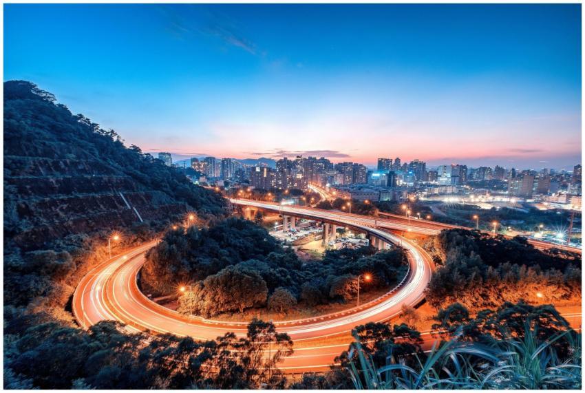 Stunning view of a city skyline with a curving hig