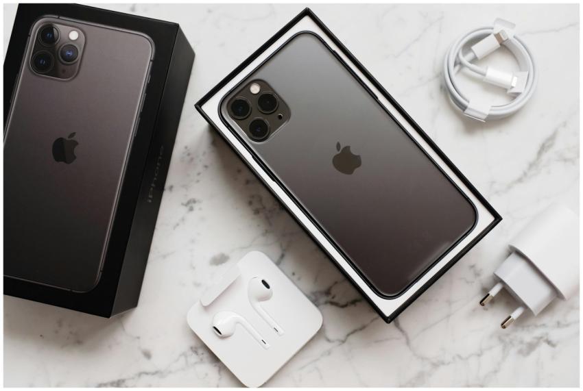 From above composition of black smartphone in box