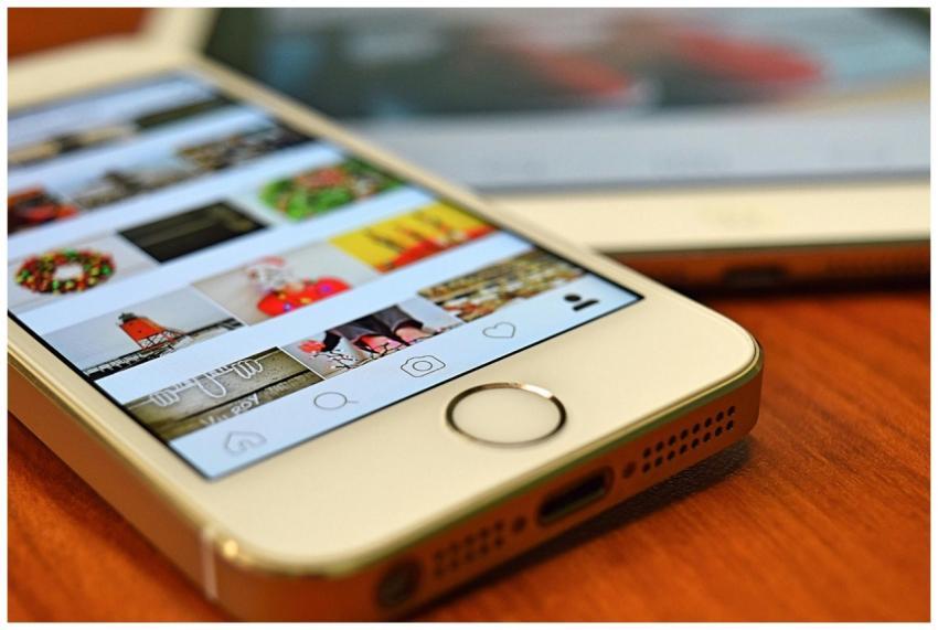 A close-up view of a smartphone displaying the Ins