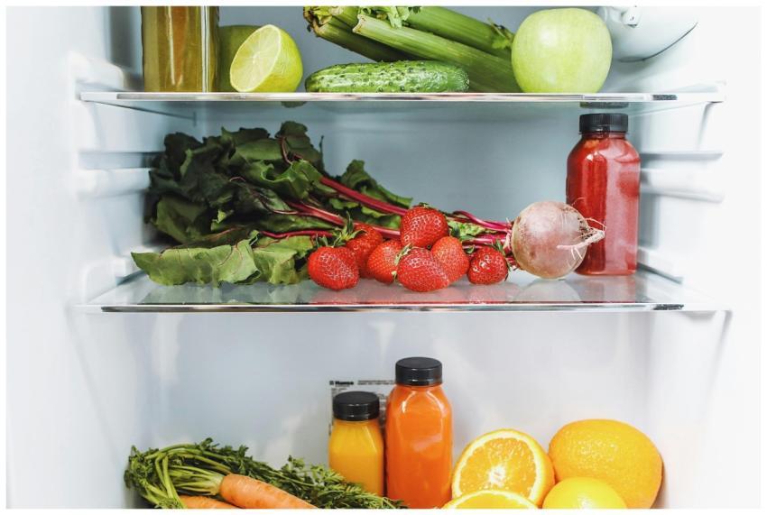 Colorful array of fresh fruits and vegetables neat