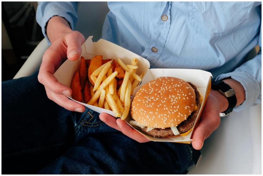 Unrecognizable male with wristwatch in casual clot