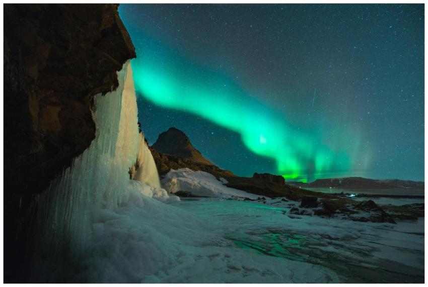 Stunning view of the Northern Lights over Kirkjufe
