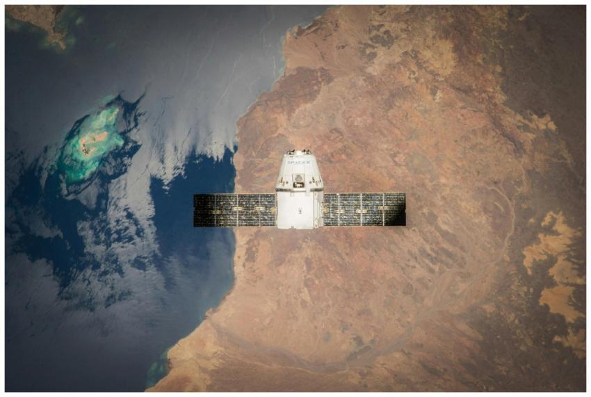 Satellite in orbit with detailed view of Earth and