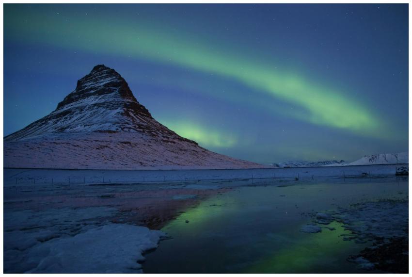 Stunning Northern Lights over Kirkjufell mountain