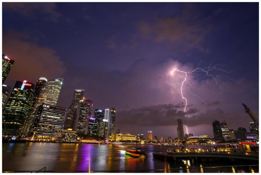 A stunning urban skyline at night with a striking