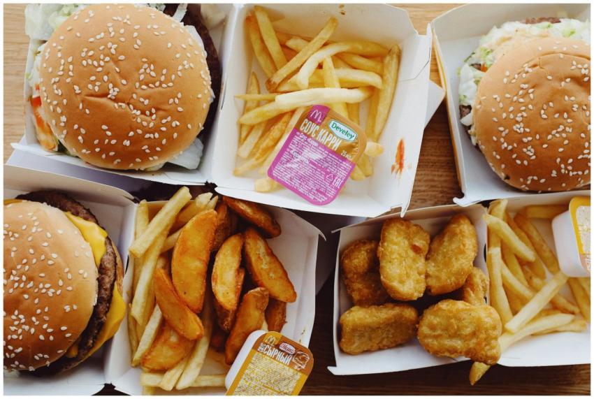Flat lay top view of various appetizing fast food