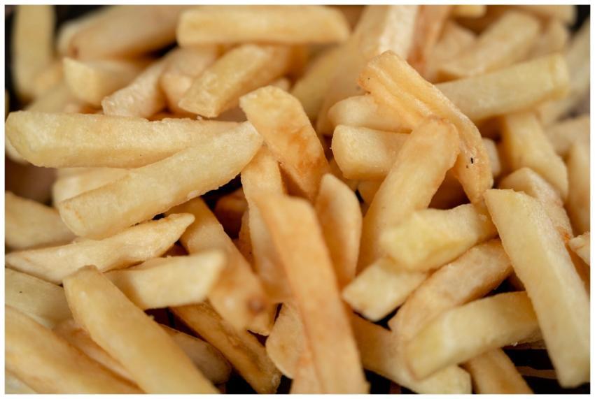Delicious pile of crispy golden french fries, the