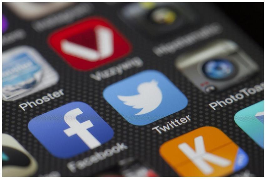 A detailed close-up of social media icons on a sma