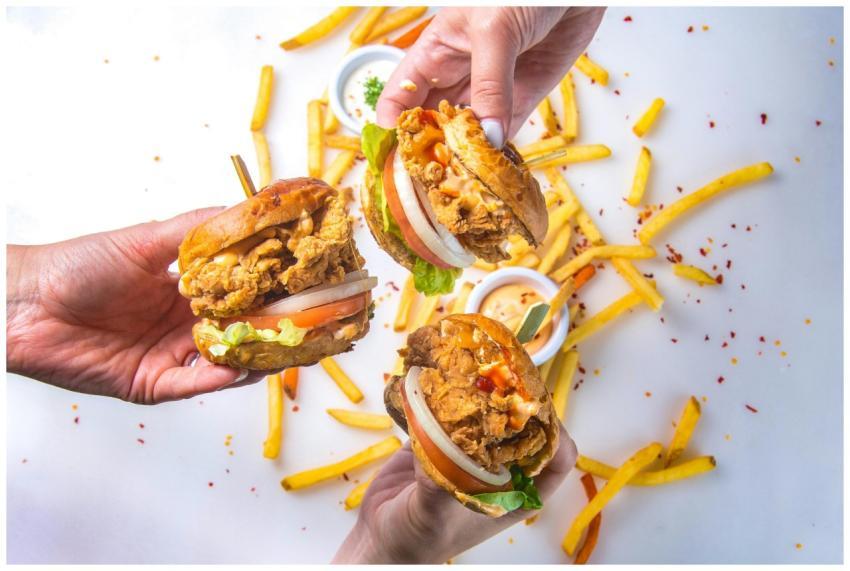 Tasty fried chicken burgers with french fries, cap