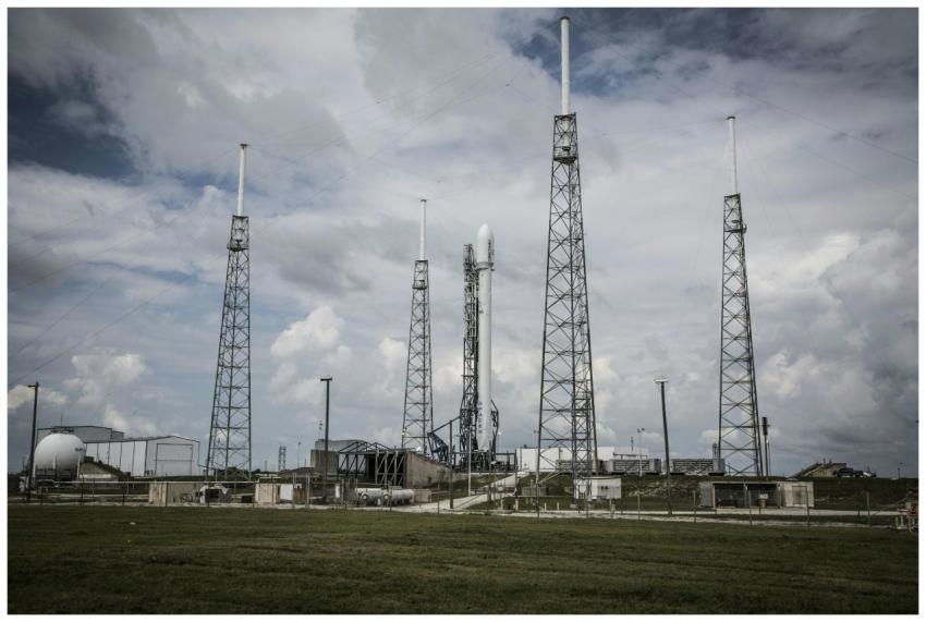 Industrial rocket launch pad with tall towers unde